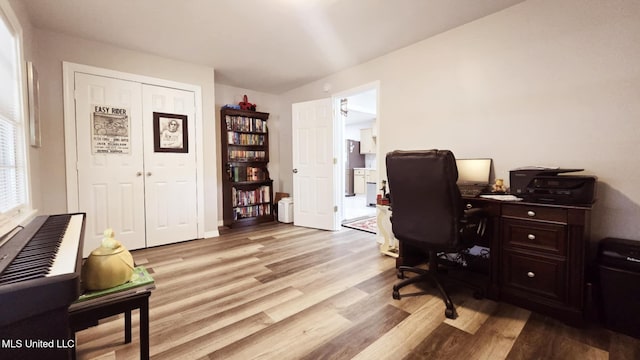 260 Roberts Ave, Holly Springs, MS 38635 - office with light wood-style floors and baseboards