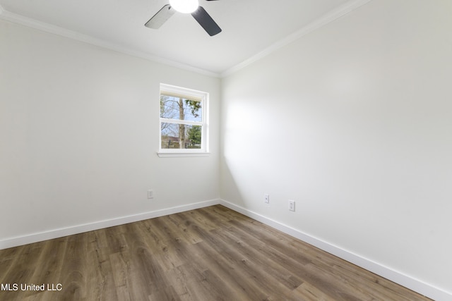 unfurnished room with ceiling fan, crown molding, baseboards, and wood finished floors