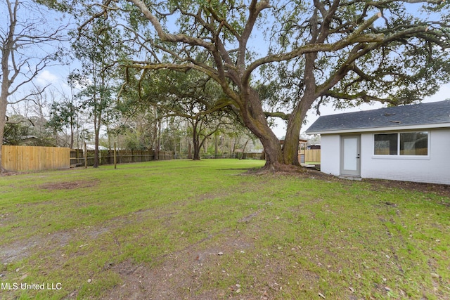 view of yard with fence