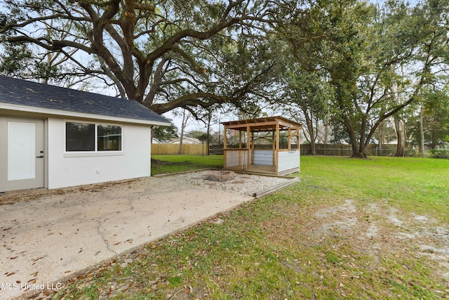 view of yard with a patio area and a fenced backyard