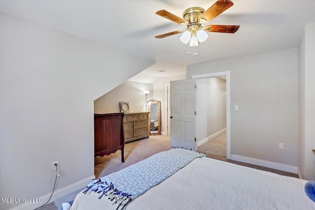 bedroom with light carpet, ceiling fan, and baseboards