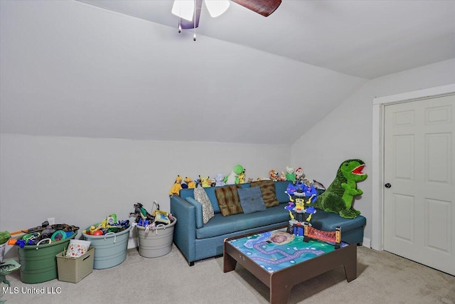 game room with a ceiling fan, lofted ceiling, and carpet flooring