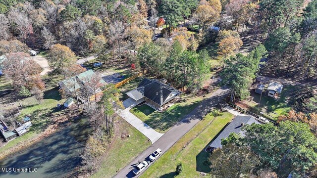 drone / aerial view with a forest view