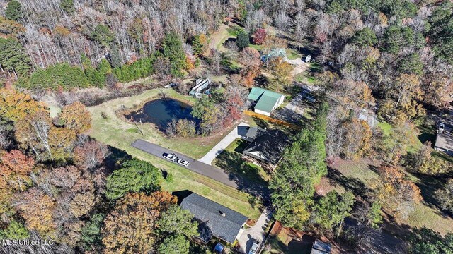 aerial view with a wooded view