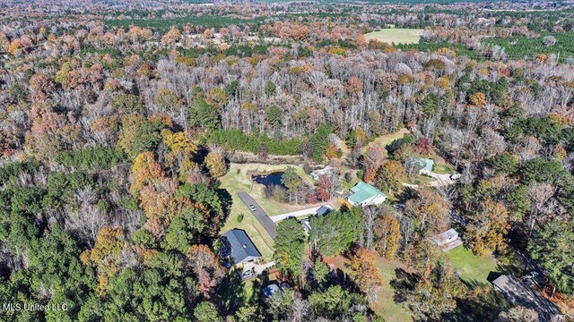 aerial view featuring a view of trees