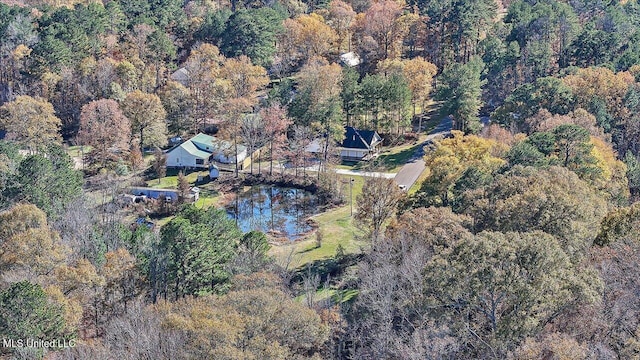 bird's eye view featuring a view of trees