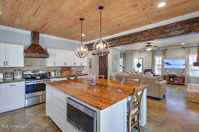 kitchen with tasteful backsplash, wood ceiling, appliances with stainless steel finishes, premium range hood, and concrete floors