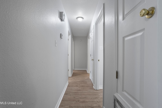 hall featuring light hardwood / wood-style flooring