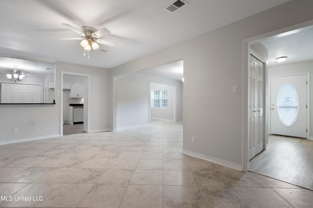 unfurnished living room with light hardwood / wood-style flooring and ceiling fan with notable chandelier