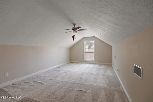 104 Willington Way, Madison, MS 39110 - additional living space with light carpet, lofted ceiling, a textured ceiling, and a ceiling fan