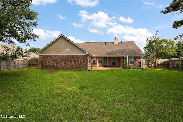104 Willington Way, Madison, MS 39110 - rear view of property with a patio area, a chimney, a fenced backyard, and brick siding
