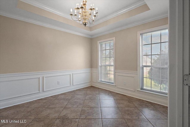 104 Willington Way, Madison, MS 39110 - unfurnished room featuring a chandelier, wainscoting, ornamental molding, a raised ceiling, and dark tile patterned flooring