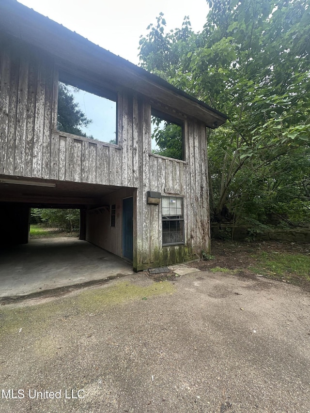 garage featuring a carport