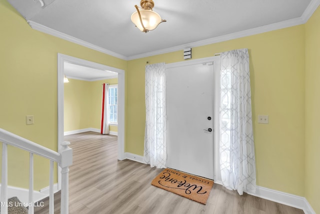112 Rolling Meadows Dr, Jackson, MS 39211 - entryway featuring wood finished floors, crown molding, and baseboards