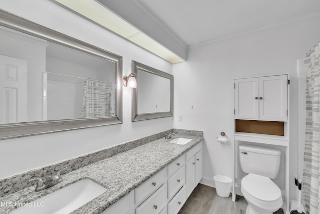 112 Rolling Meadows Dr, Jackson, MS 39211 - full bath with double vanity, toilet, crown molding, curtained shower, and wood finished floors