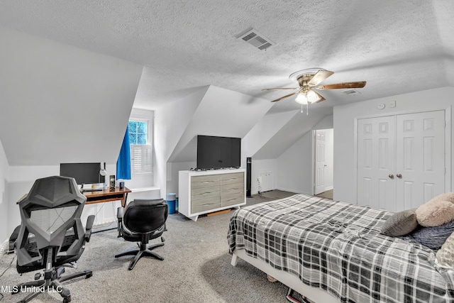 112 Rolling Meadows Dr, Jackson, MS 39211 - bedroom with lofted ceiling, carpet flooring, a desk, a ceiling fan, and a textured ceiling