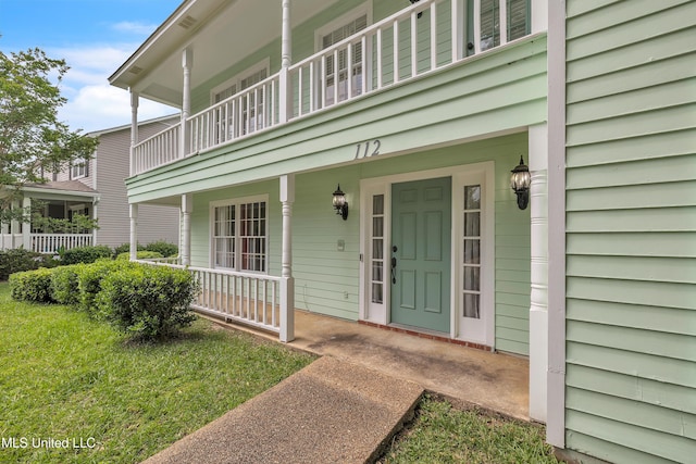 112 Rolling Meadows Dr, Jackson, MS 39211 - doorway to property with a porch and a balcony