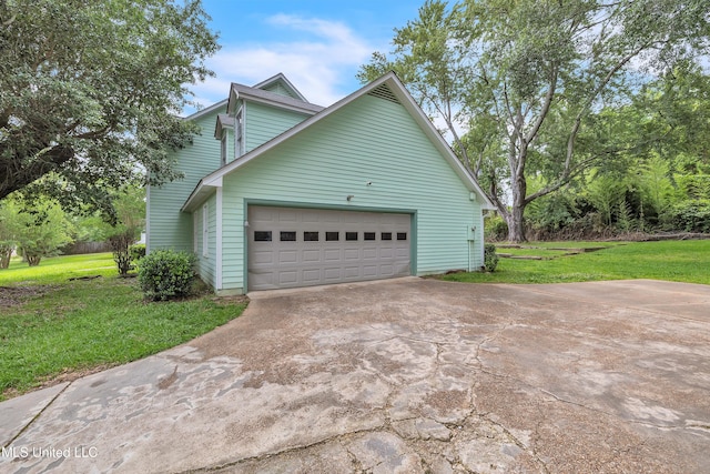 112 Rolling Meadows Dr, Jackson, MS 39211 - view of property exterior with an attached garage, driveway, and a lawn