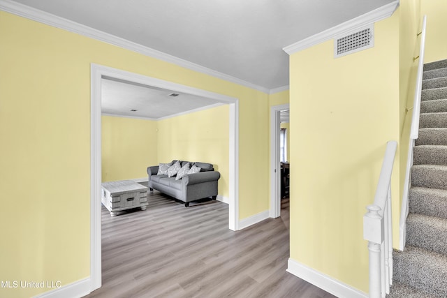 112 Rolling Meadows Dr, Jackson, MS 39211 - hallway featuring stairway, baseboards, ornamental molding, and wood finished floors