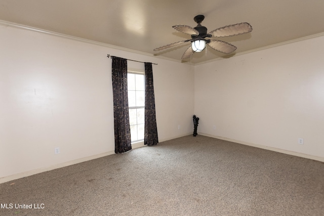 unfurnished room with ornamental molding, carpet, and ceiling fan