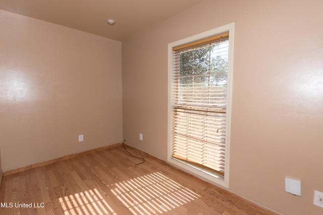 empty room with light wood-type flooring