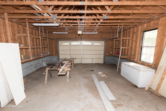 garage featuring white fridge