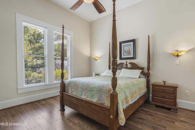 bedroom featuring baseboards, ceiling fan, and wood finished floors