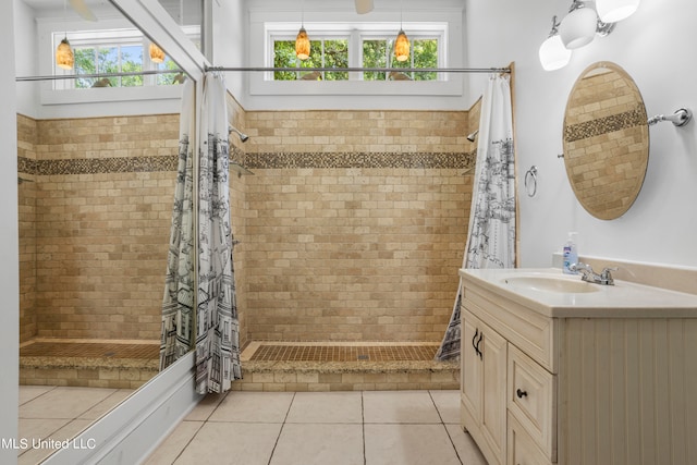 bathroom with vanity, a shower with curtain, and tile patterned floors