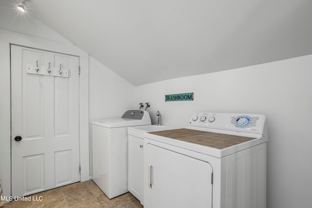 clothes washing area with washing machine and clothes dryer