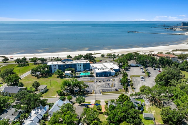 aerial view featuring a water view and a view of the beach