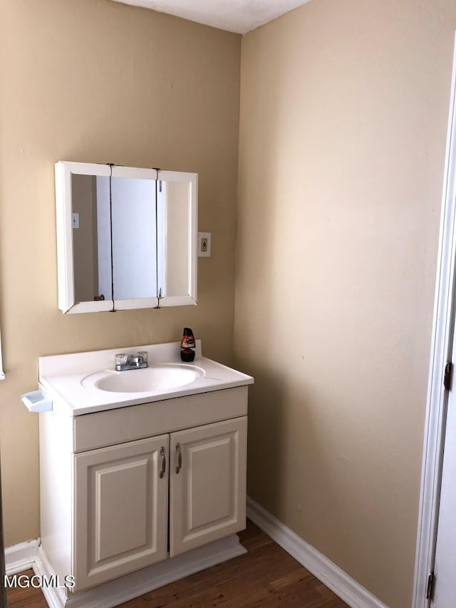 1412 Jo Ellen Cir, Gulfport, MS 39501 - bathroom with vanity and wood finished floors