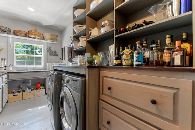 washroom featuring independent washer and dryer