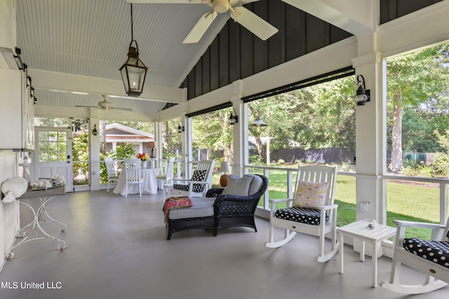 sunroom / solarium with vaulted ceiling and plenty of natural light