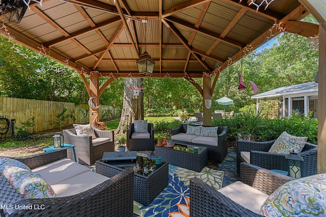 view of patio with a gazebo and an outdoor hangout area