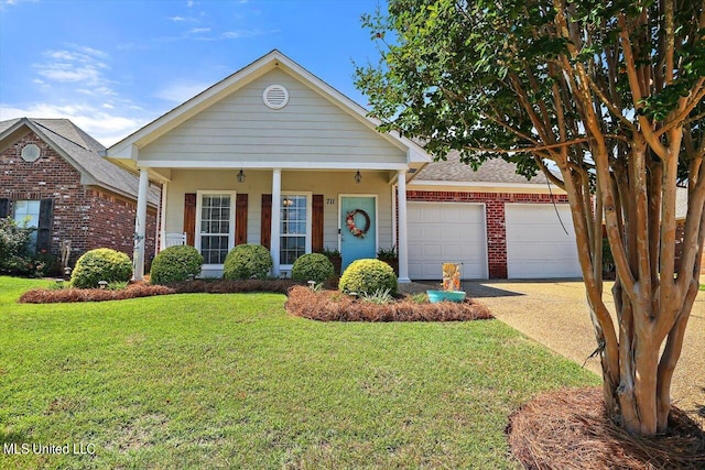 view of front of property with a garage and a front lawn