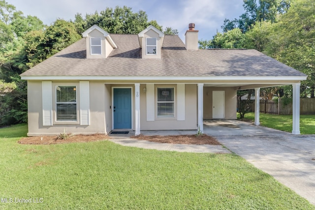 20 Oakmont Pl, Long Beach, MS 39560 - view of front facade with a chimney, roof with shingles, driveway, and stucco siding