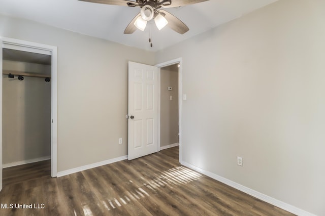 20 Oakmont Pl, Long Beach, MS 39560 - unfurnished bedroom featuring dark wood-type flooring, a closet, and a ceiling fan