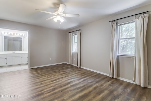 20 Oakmont Pl, Long Beach, MS 39560 - empty room with ceiling fan and wood finished floors