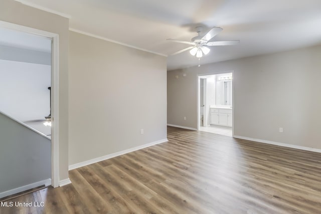 20 Oakmont Pl, Long Beach, MS 39560 - unfurnished room featuring ceiling fan, wood finished floors, and crown molding