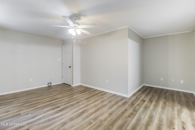 20 Oakmont Pl, Long Beach, MS 39560 - empty room featuring wood finished floors, ornamental molding, and ceiling fan