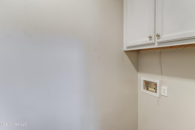 20 Oakmont Pl, Long Beach, MS 39560 - laundry area with cabinet space and hookup for a washing machine