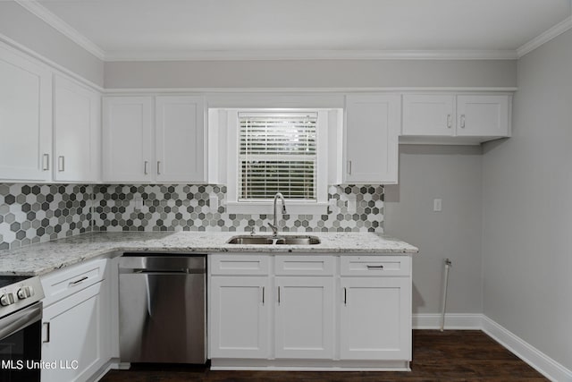 kitchen featuring white cabinetry, stainless steel appliances, sink, and light stone counters