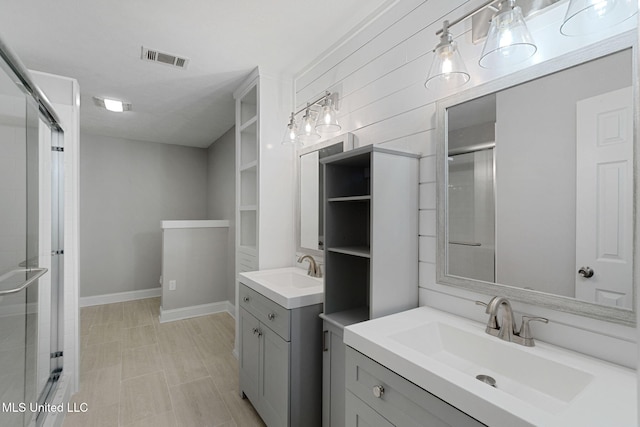 bathroom featuring vanity and walk in shower