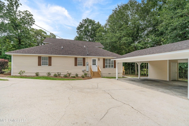 single story home with a carport