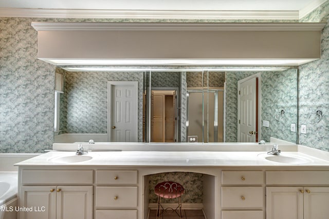 bathroom featuring ornamental molding, separate shower and tub, and vanity