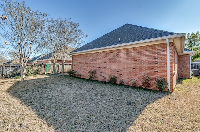 view of home's exterior featuring a lawn