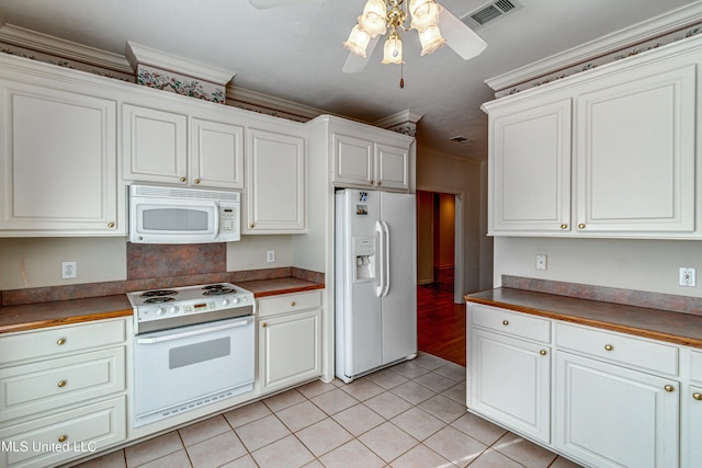 kitchen featuring white cabinetry, white appliances, light tile patterned floors, and ornamental molding