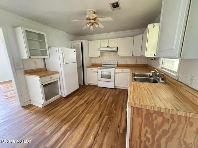 165 Canal St, Gulfport, MS 39507 - kitchen featuring white appliances, a sink, under cabinet range hood, white cabinets, and ornamental molding