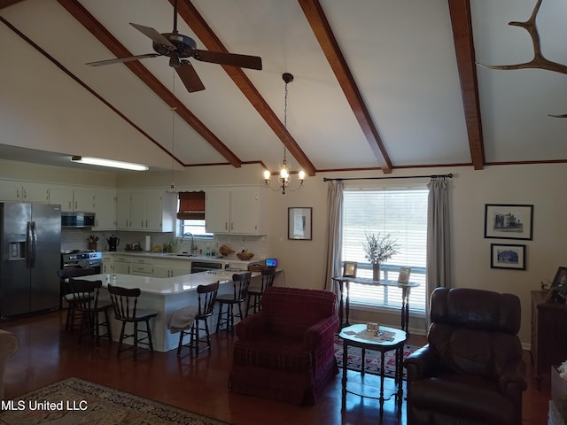 114 S 49th Hwy, Indianola, MS 38751 - kitchen featuring black appliances, a sink, light countertops, ceiling fan, and a kitchen breakfast bar