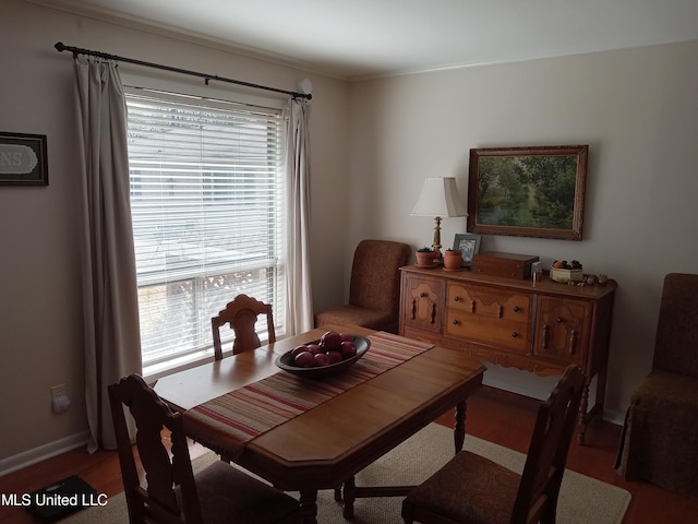114 S 49th Hwy, Indianola, MS 38751 - dining room featuring light wood-style floors, ornamental molding, and baseboards